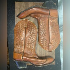 Acme women’s brown cowboy boots. Lots of wear left.